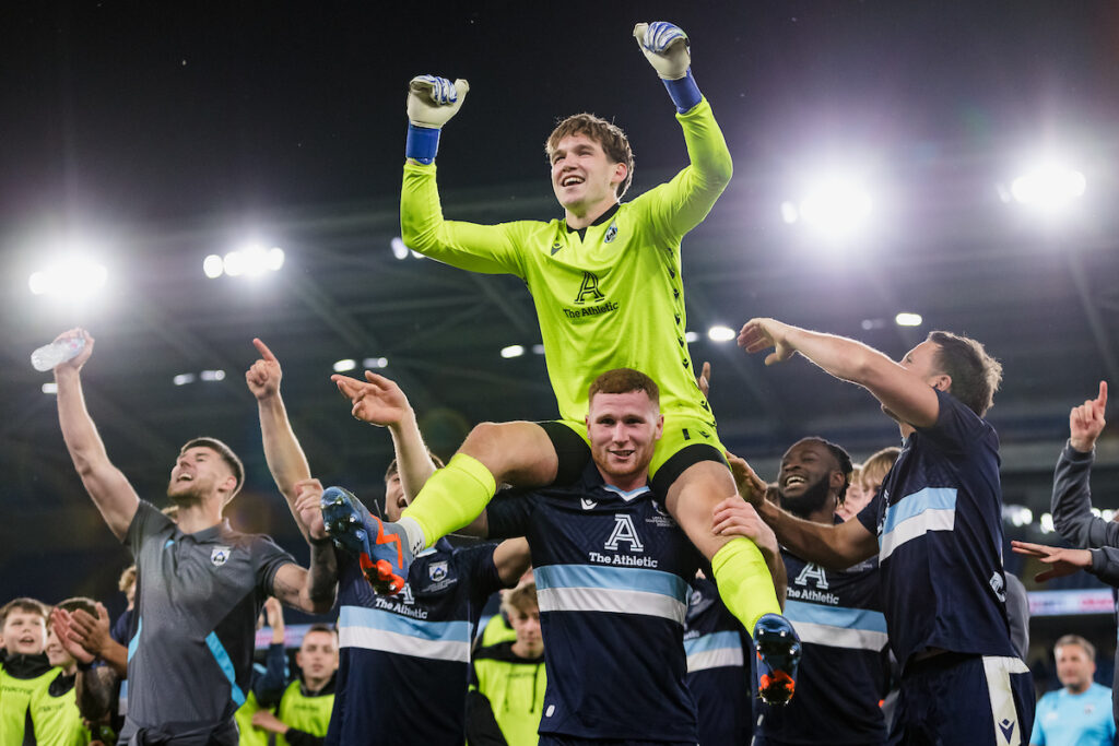 Haverfordwest County's goalkeeper Zac Jones and Haverfordwest players celebrate winning the game on penalty kicks after extra time of the UEFA Europa Conference League qualifier second leg fixture between Cymru premier’s Haverfordwest County & KF Shkëndija of North Macedonia at the Cardiff City Stadium, Cardiff, Wales.
