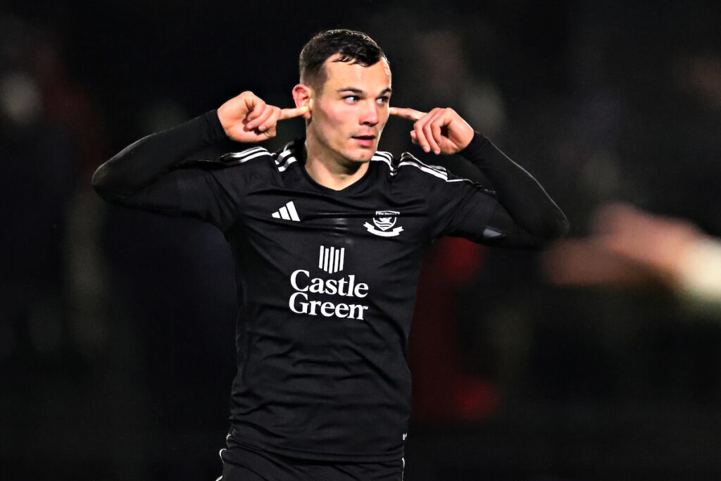 Jordan Davies celebrates scoring a goal for Cymru Leagues Premier side Connah's Quay Nomads.