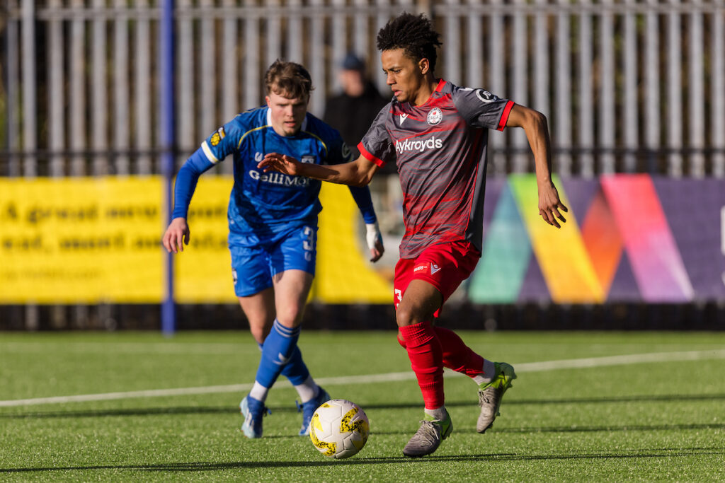 Bala Town's Uniss Kargbo during the 2024/25 JD Cymru Premier Championship Conference league fixture between Haverfordwest County AFC and Bala Town FC at The Ogi Bridge Meadow Stadium, Wales