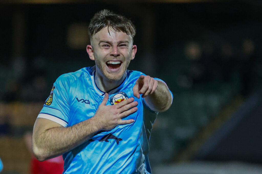 Lathan Garrett of Newport City FC celebrates after scoring during the 2024/25 JD Cymru Leagues South fixture between Newport City FC and Afan Lido FC at Newport Stadium, Newport, Wales