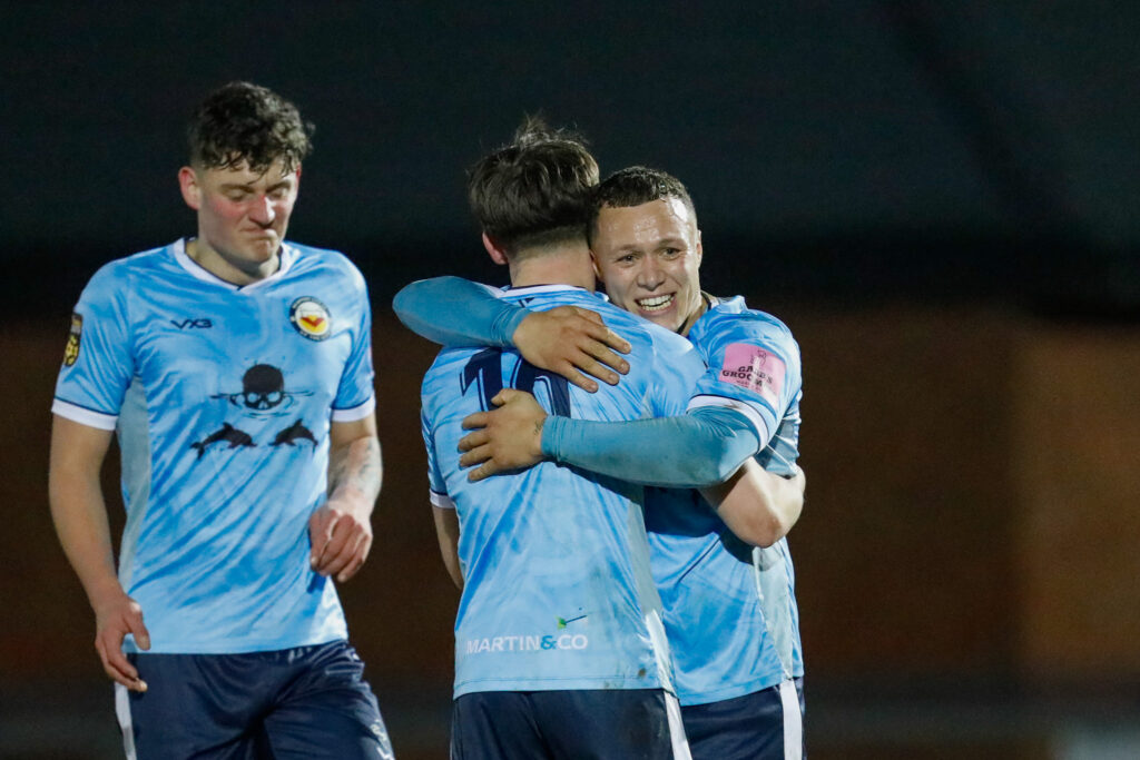 Kofi Rowe of Newport City FC celebrates after scoring during the 2024/25 JD Cymru South fixture between Newport City FC and Afan Lido FC at Newport Stadium, Newport, Wales.