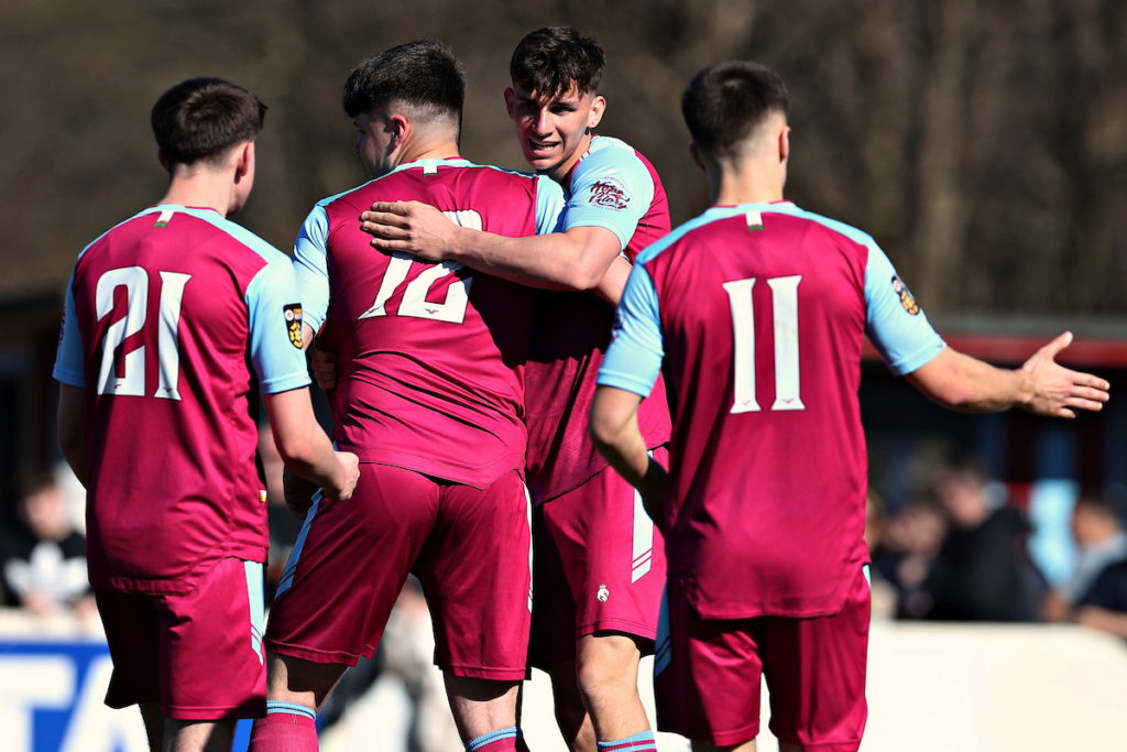 Colwyn Bay celebrate scoring against Llandudno in the JD Cymru Leagues North