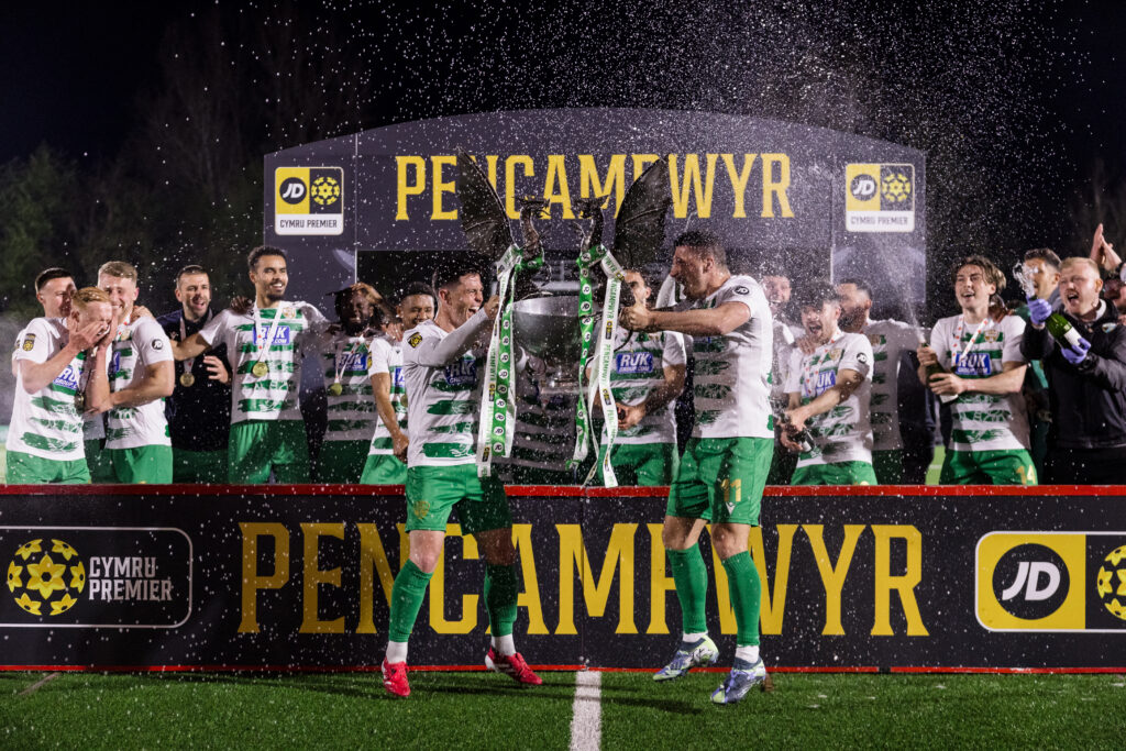 TNS celebrating winning the league during the Second Phase of the JD Cymru Premier 2024/25 Championship Conference league fixture between The New Saints FC & Bala Town FC at Park Hall, Oswestry, Wales