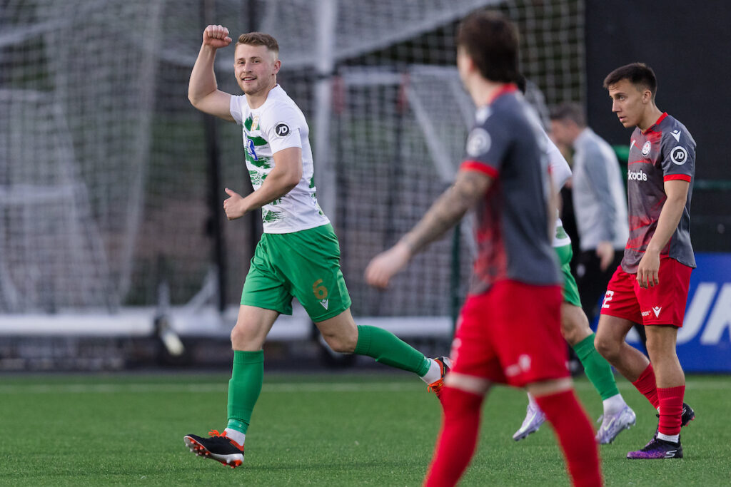 The New Saints' Jack Bodenham scores and celebrates during the Second Phase of the JD Cymru Premier 2024/25 Championship Conference league fixture between The New Saints FC & Bala Town FC at Park Hall, Oswestry, Wales
