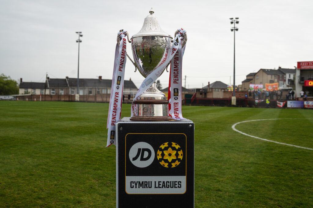 A general view of the JD Cymru South trophy on a plinth at Llanelli Town's Stebonheath Park