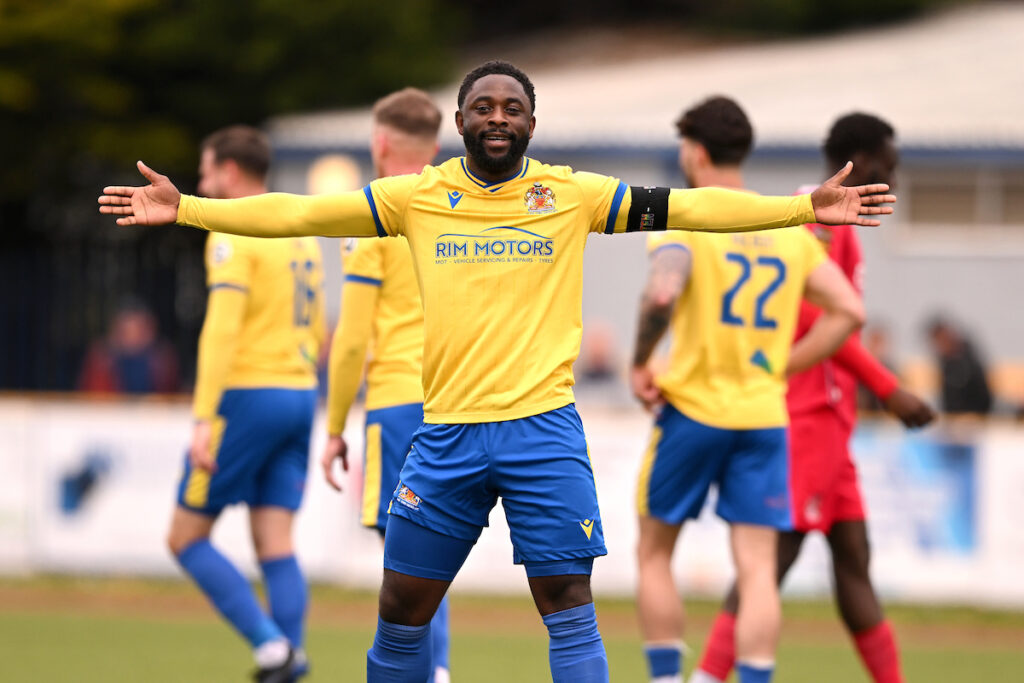 Barry Town's Kayne Mclaggon celebrates scoring his sides second goal during the JD Cymru Premier 24/25 Play Off Conference match between Barry Town United and Briton Ferry Llansawel FC at Jenner Park Stadium in Barry on the 19th April 2025