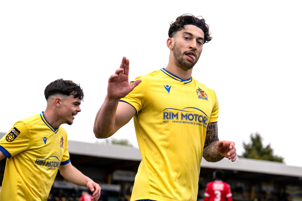 Ollie Hulbert celebrates scoring for JD Cymru Leagues Premier side Barry Town United. 