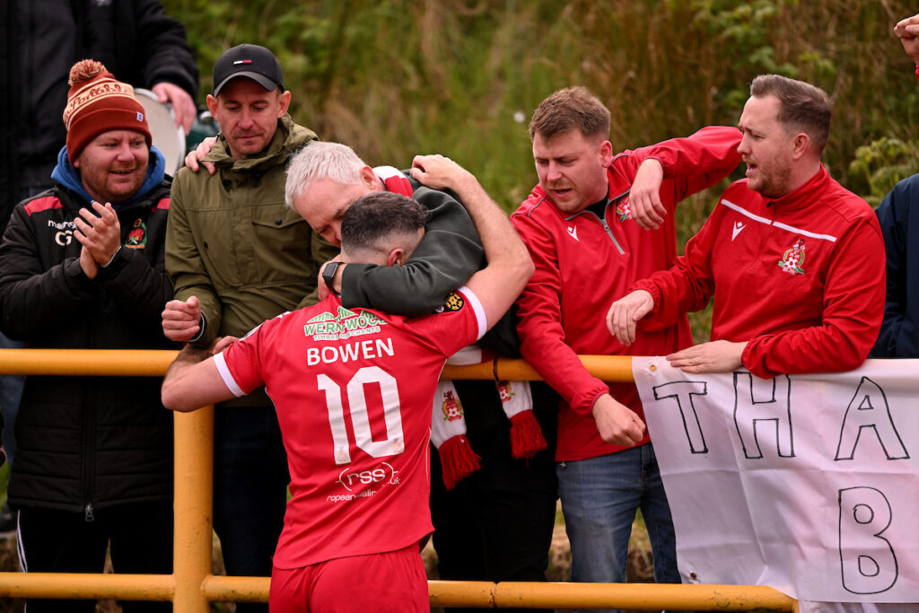 Luke Bowen hugs Briton Ferry Llansawel supporters