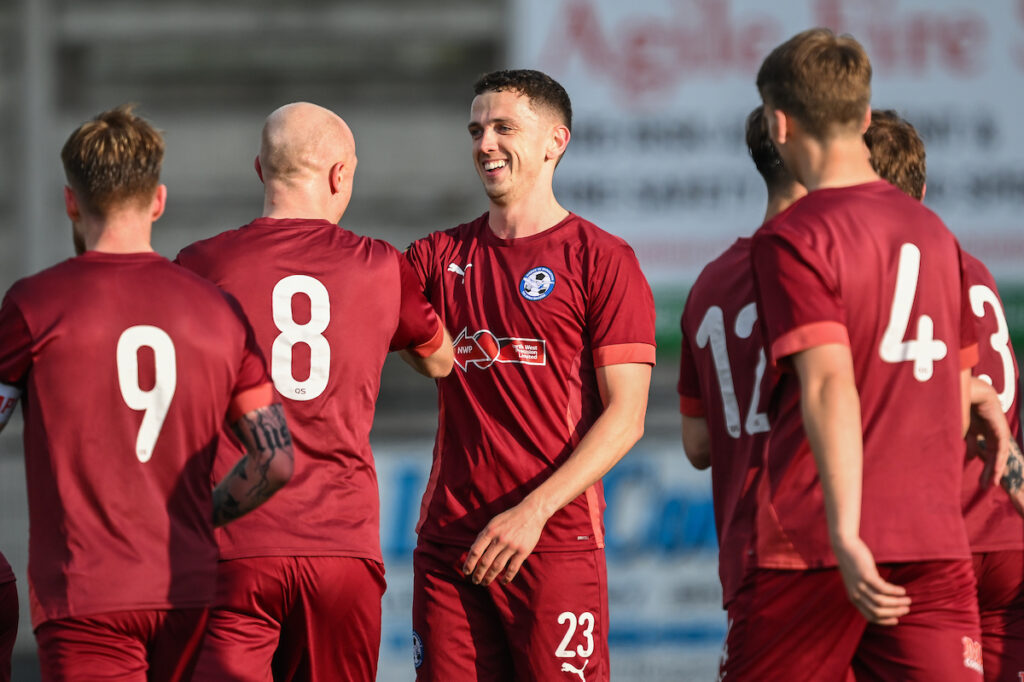 Nathan Williams of Airbus UK Broughton celebrates his goal to make it 1-3 during the 2024/25 Welsh Blood Service League Cup Final fixture between Trefelin BGC v Airbus UK Broughton FC at Park Avenue, Aberystwyth, Wales