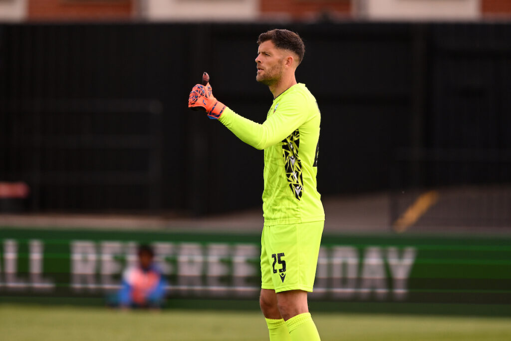 Connor Roberts gives a thumbs up whilst playing for The New Saints in the JD Welsh Cup final