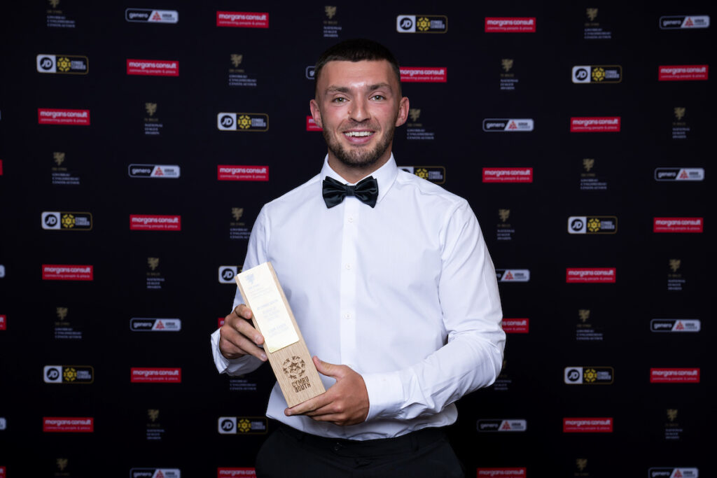 Liam Eason with the JD Cymru South Player of the Season award