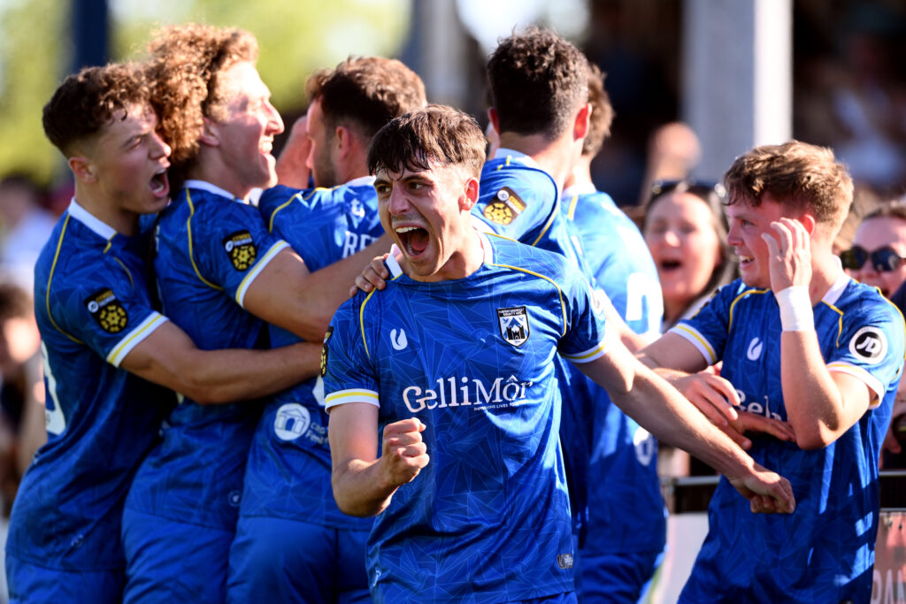 Haverfordwest County's Daniel Hawkins celebrates scoring his sides second goal during the JD Cymru Premier 24/25 - European Play Off match between Haverfordwest County AFC and Caernarfon Town at Ogi Bridge Meadow Stadium in Haverfordwest on the 18th May 2025