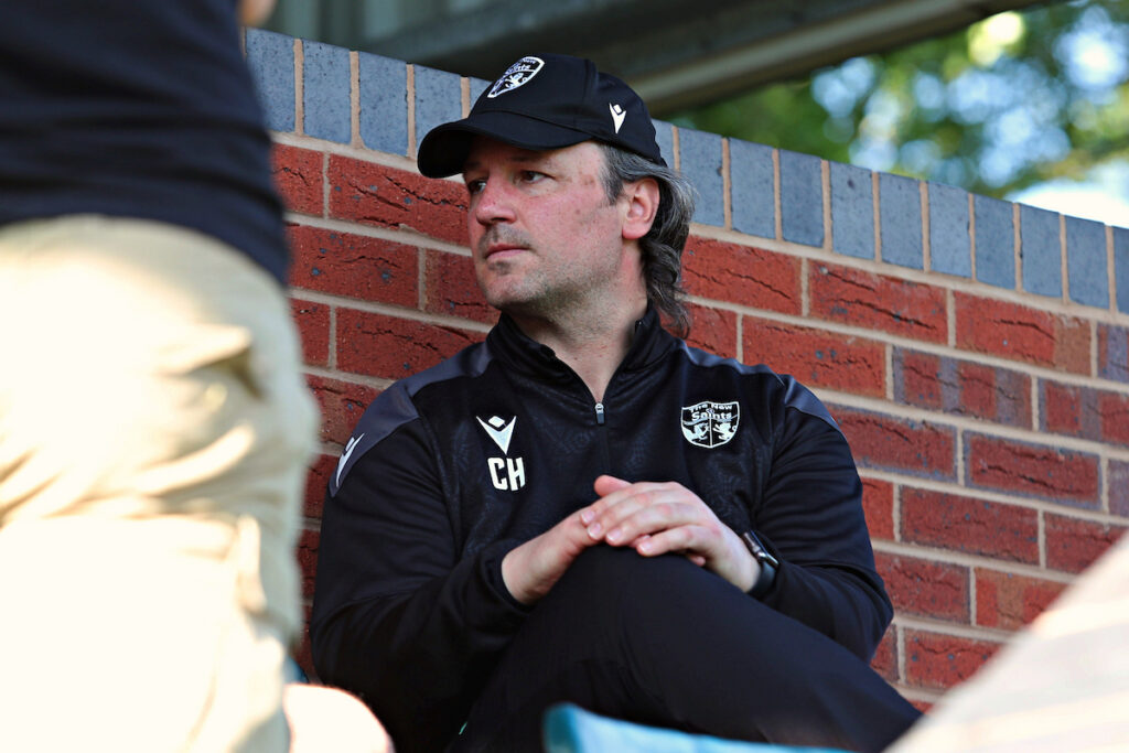 Craig Harrison in the dugout at The New Saints during a UEFA Champions League qualifier