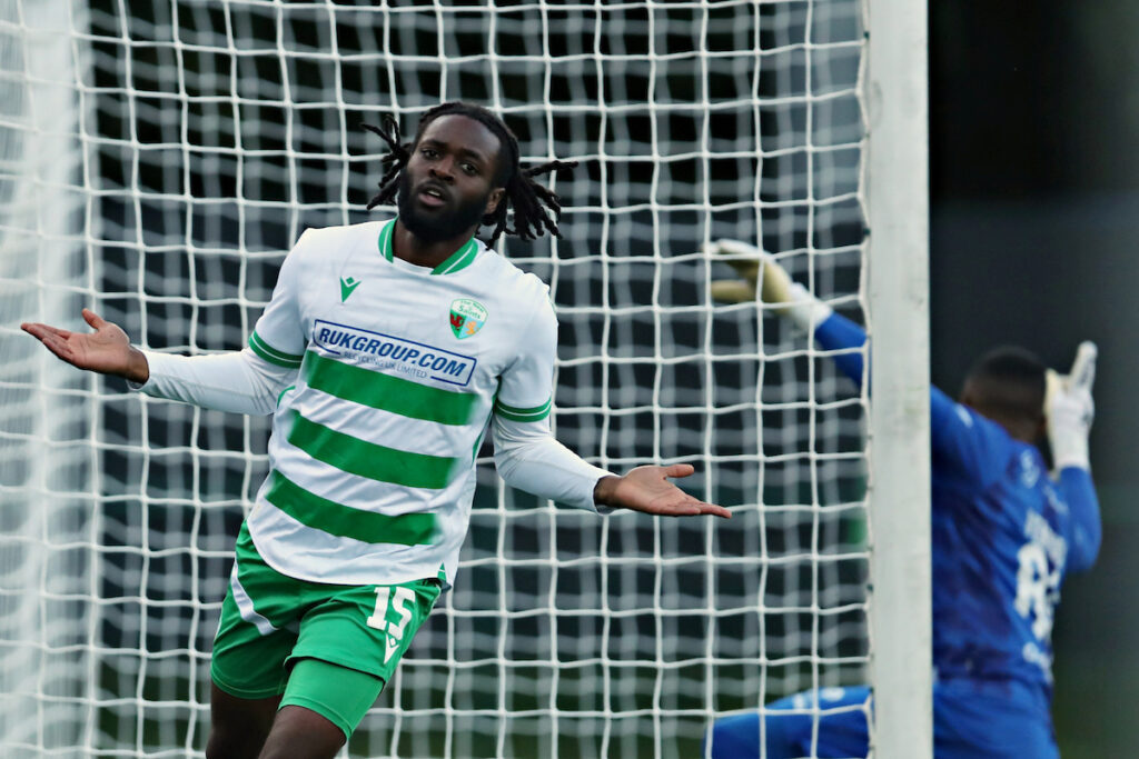 Aramide Oteh celebrates an offside goal for The New Saints