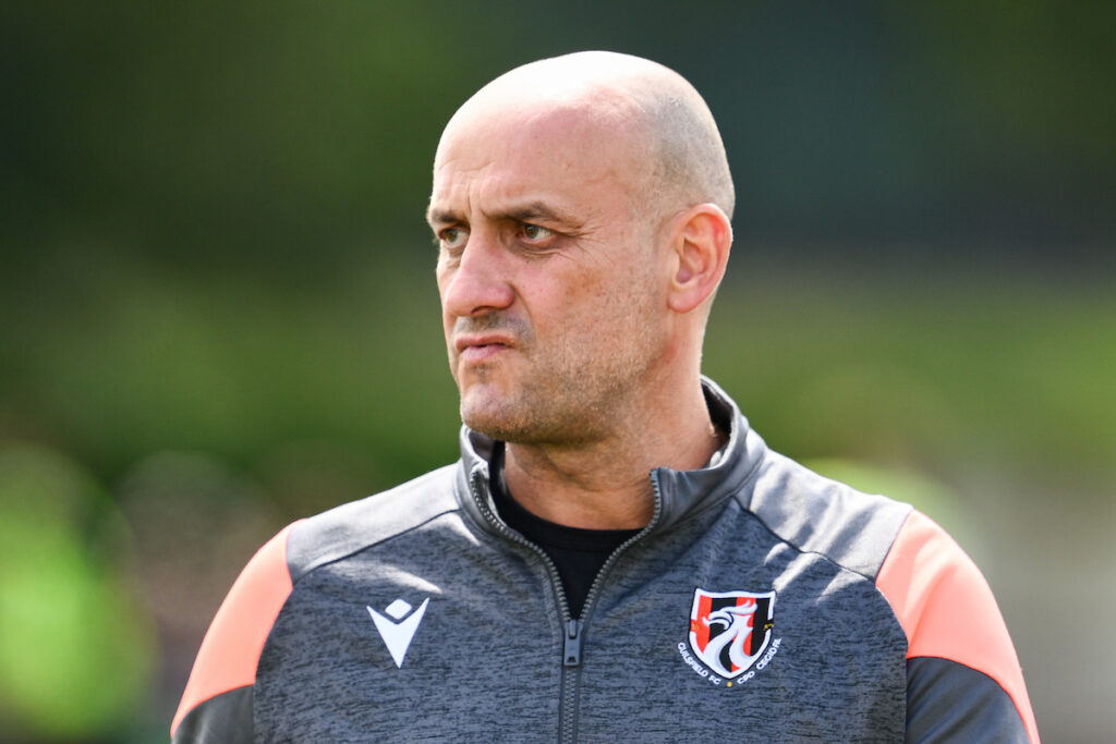 Gavin Allen, Manager of Guilsfield heads to the dressing roommate half time during the Nathaniel MG Cup between Guilsfield and Bala Town at the PRS Recruitment Stadium, in Guilsfield on the 2nd August 2025
