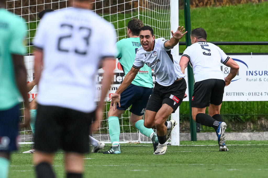 Hussein Mehasseb of Bala Town celebrates his goal to make it 1-0 during the JD Cymru Premier between Bala Town and Flint Town at the Maes Tegid in Bala on the 08th August 2025