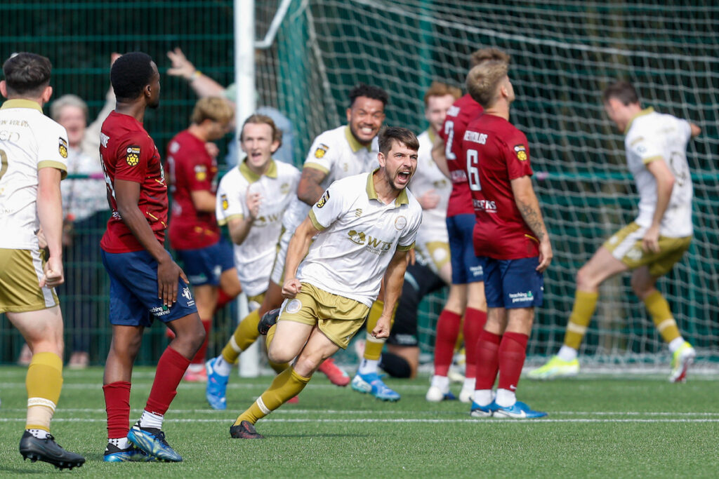 Darren Thomas of Caernarfon Town celebrates after scoring during the 2025/26 JD Cymru Premier league fixture between Cardiff Met University FC and Caernarfon Town at Cyncoed Stadium, Cardiff, Wales