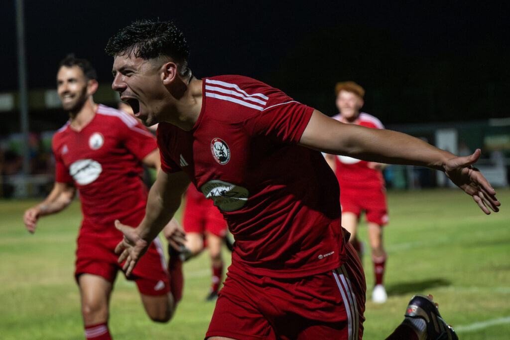 Luke Mariette of Buckley Town scores to make it 3-2 during the JD Cymru North game between Buckley Town and Ruthin Town at the Globe in Buckley on the 15th August 2025