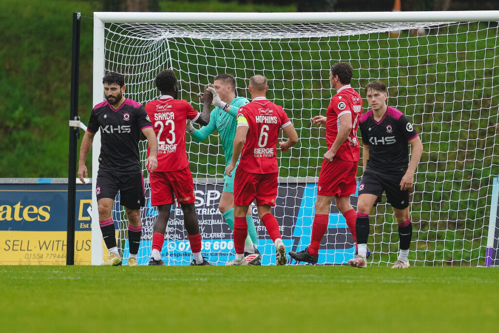 Alex Pennock of Llanelli Town celebrating saving Louis Robles of Colwyn Bay penalty during the JD Cymru Premier 2025/26 fixture Llanelli Town vs Colwyn Bay at Stebonheath Park, Llanelli, Wales