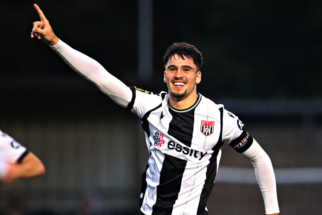 Harry Owen of Flint Town United celebrates his second goal during Flint Town United vs Briton Ferry Llansawel in Round 10 of the JD Cymru Premier at Cae Y Castell, Flint