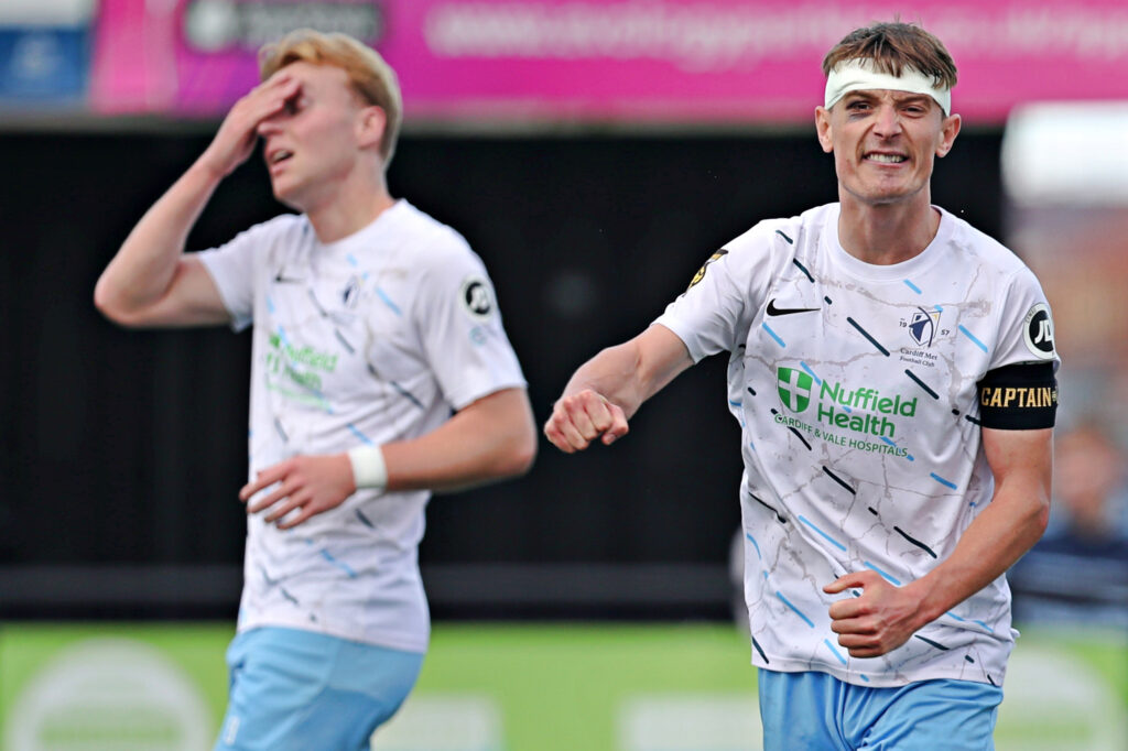 CJ Craven of Cardiff Met celebrates after Caernarfon Town vs Cardiff Met FC in Round 10 of the JD Cymru Premier at the Go Goodwins Stadium, Llandudno
