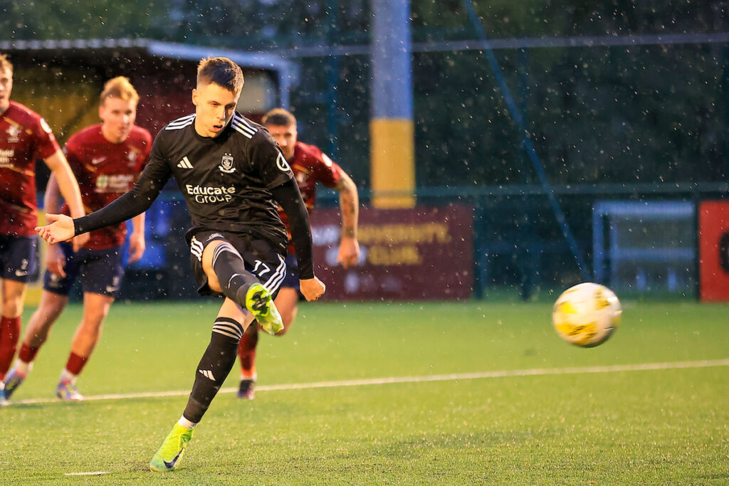 Rhys Hughes of Connah's Quay Nomads scores during the 2025/26 JD Cymru Premier league fixture between Cardiff Met University FC & Connah’s Quay Nomads at Cyncoed Stadium, Cardiff, Wales.