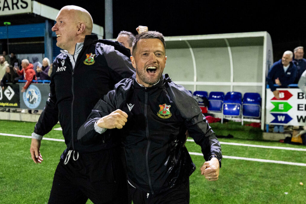 Llanelli Town manager Lee John celebrates at full time.
Cambrian United v Llanelli Town in the JD Cymru South at the M&P Group 3G on the 4th April 2025