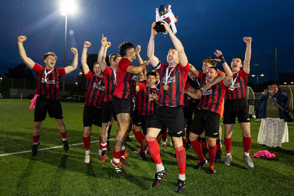 Ynyshir Albions celebrating promoting to the JD Cymru South after winning the Ardal South Play-Offs