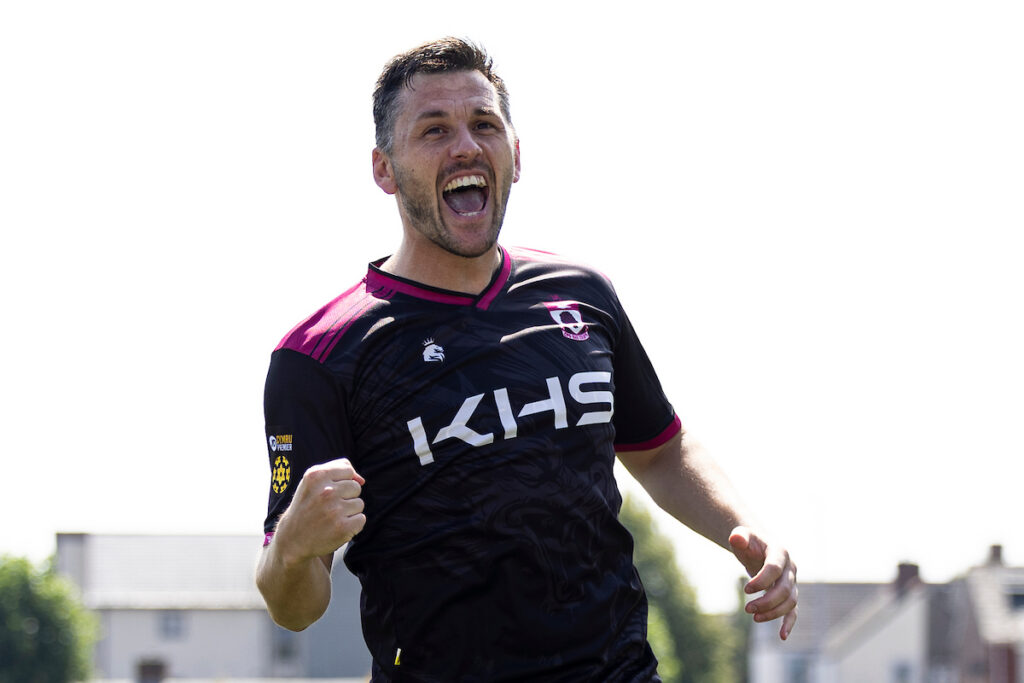 Aaron Williams of Colwyn Bay celebrates scoring his sides first goal.
Barry Town United v Colwyn Bay in the JD Cymru Premier at Jenner Park on the 16th August 2025