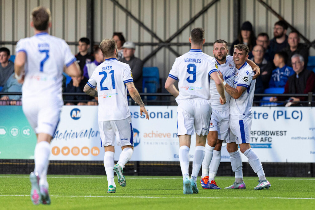 Mael Davies of Penybont celebrates scoring his sides first goal.
Haverfordwest County v Penybont in the JD Cymru Premier at Bridge Meadow Stadium on the 8th August 2025.