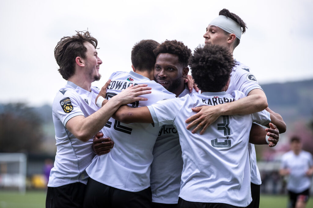 Bala Town's Callum Edwards celebrates his goal during the JD Cymru Premier fixture between Bala Town and Penybont at Maes Tegid, Bala. 19th of April, Bala, Wales