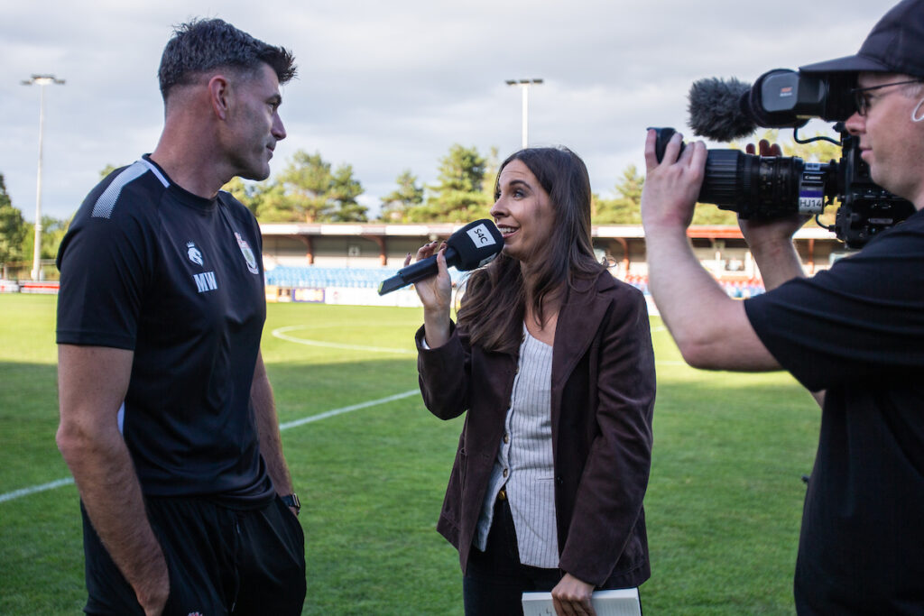 Signed Dafydd interviews Colwyn Bay manager Michael Wilde on S4C.
