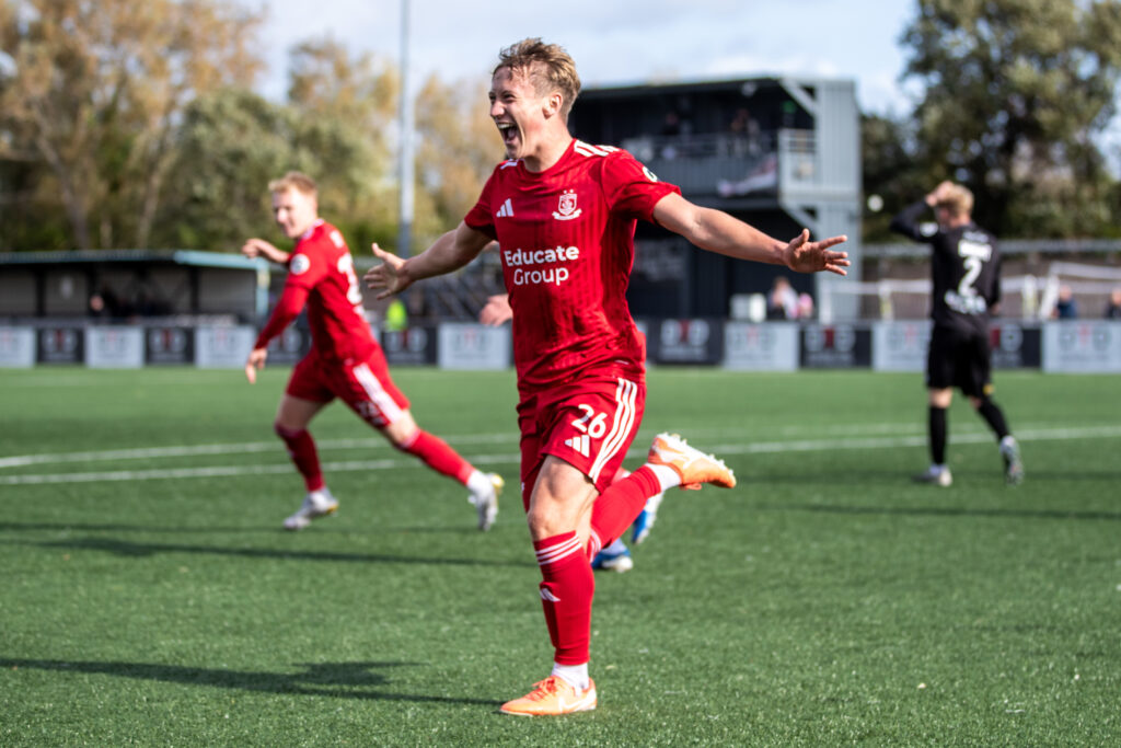 Connah's Quay Nomads' Jacob Cook celebrates opening the scoring during the JD Cymru Premier fixture between Connah’s Quay Nomads and Llanelli Town AFC at the Essity Stadium, Flint. 4th of October, Flint, Wales
