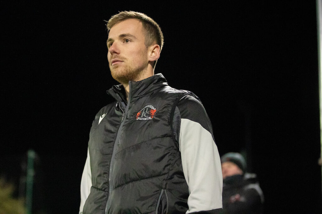 Llandudno Manager, Jordan Hadaway during the JD Welsh Cup fixture between Llandudno and Connah’s Quay Nomads at the Go Goodwins Stadium, Llandudno. 18th of November, Llandudno, Wales