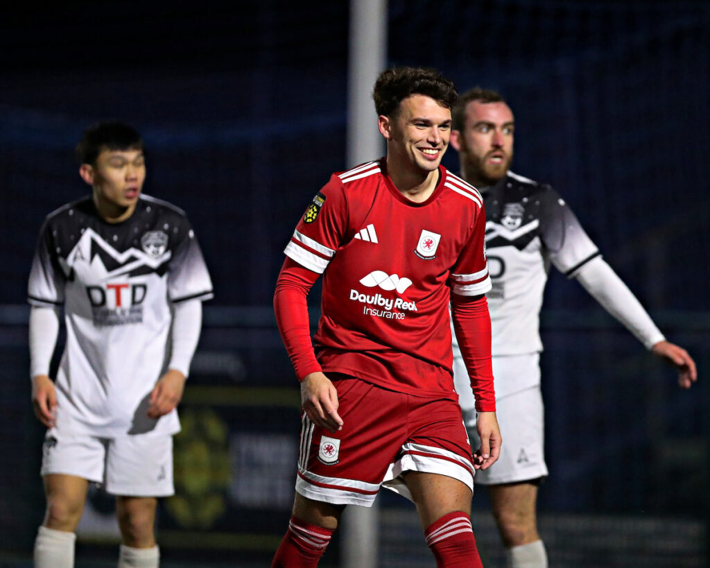 Haci Ozlu of Gresford Athletic celebrates winning a penalty during Gresford Athletic vs Flint Mountain FC in Round 23 of the JD Cymru North at the Hollingsworth Group Stadium, Broughton