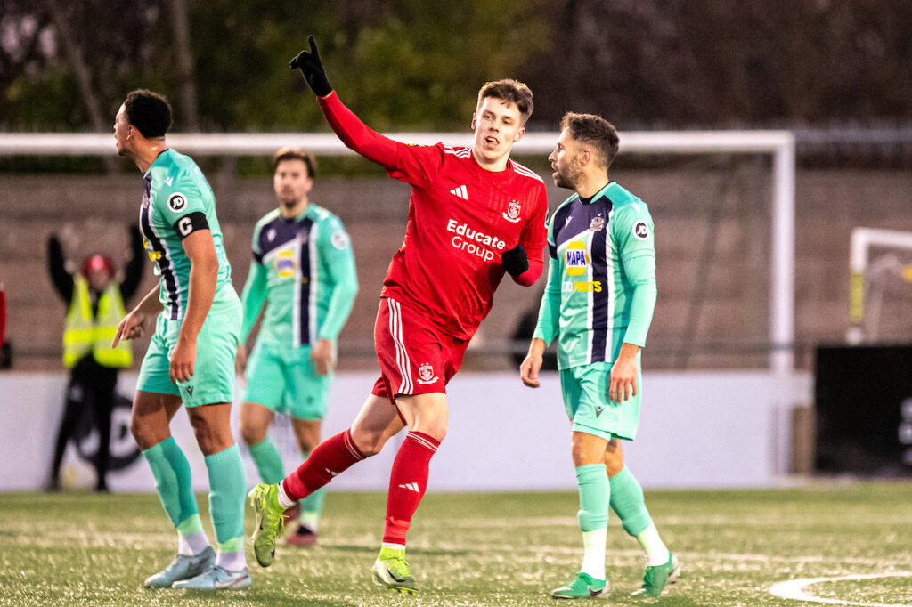 Connah's Quay Nomads' Rhys Hughes makes it 3-1 during the JD Cymru Premier fixture between Connah's Quay Nomads and Barry Town United at the Essity Stadium, Flint. 3rd of January, Flint, Wales