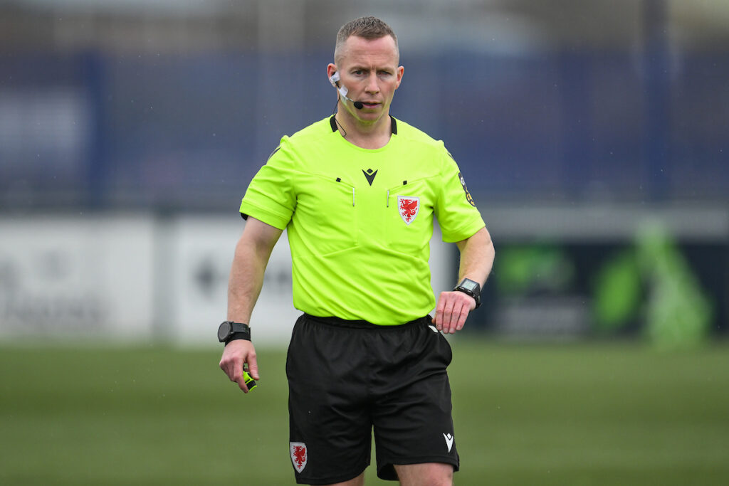 Referee Karl Berry during the 2024/25 JD Cymru North fixture between Gresford Athletic & Caersws at The Hollingsworth Group Stadium, Broughton, Wales