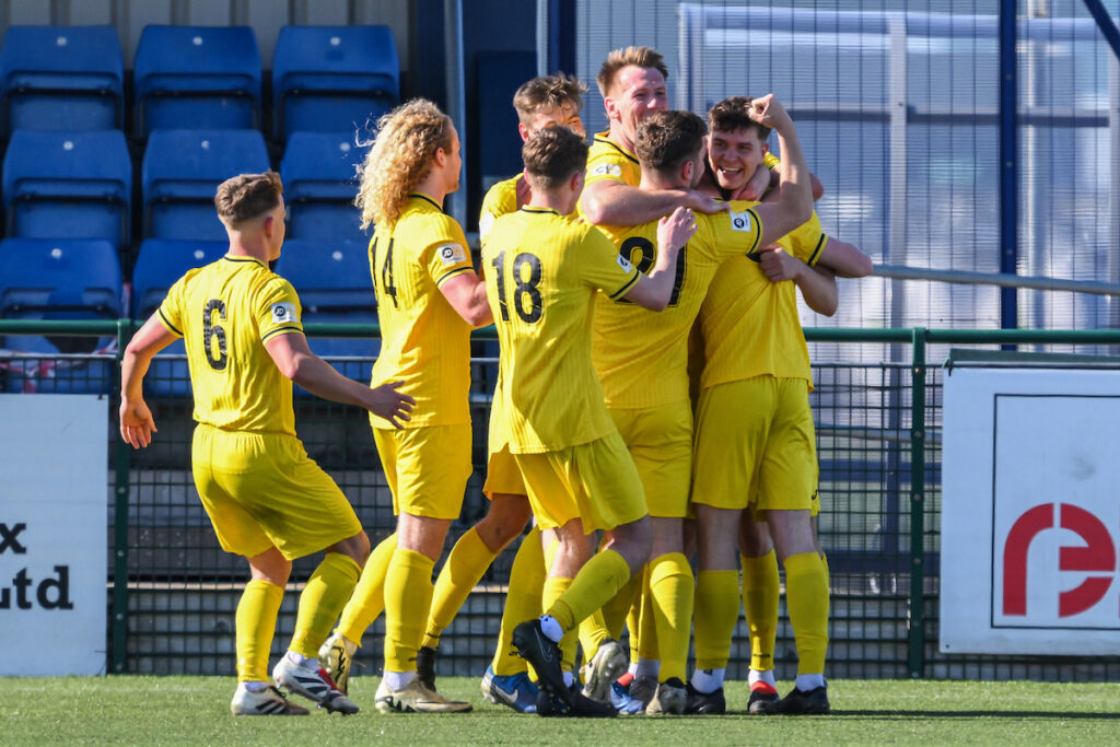 Lucas Gregson of Mold Alexandra FC celebrates his goal to make it 1-1 during the 2024/25 JD Cymru North fixture Airbus UK Broughton FC v Mold Alexandra FC at The Hollingsworth Group Stadium, Broughton, Wales