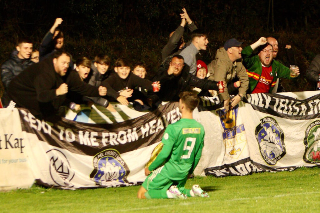 Rhyl celebrate scoring against Holywell Town in the JD Cymru North. 