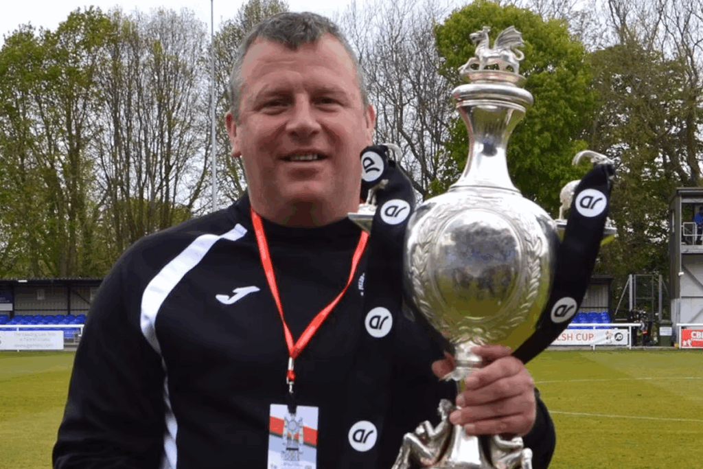 Colin Caton poses with the Welsh Cup trophy after winning with Bala Town in 2016/17