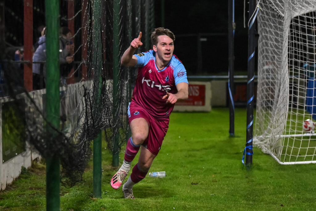 James Owen of Colwyn Bay celebrates his goal to make it 2-0 during the 2024/25 JD Cymru North fixture between Colwyn Bay FC and Buckley Town FC at Four Crosses Construction Arena, Colwyn Bay, Wales