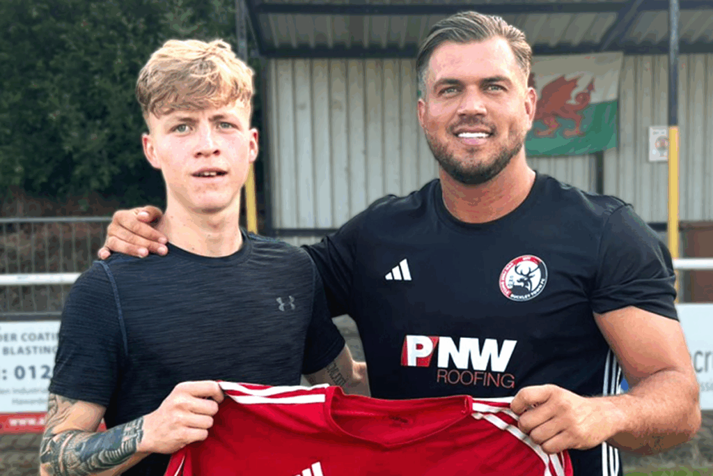 Oli Blayney poses alongside Buckley Town manager Asa Hamilton.