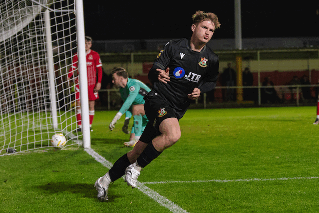 Danny Williams celebrates scoring for Llanelli Town against Briton Ferry Llansawel in the JD Cymru Premier.